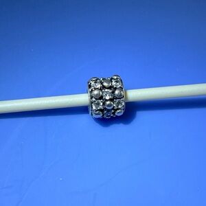 Chamilia retired Gleaming Splendor Sterling silver charm with clear CZ stones.